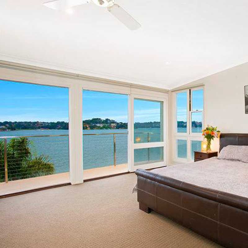 Bedroom with a water view